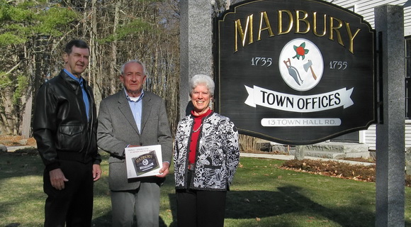 Author of a childrens book on Madbury, Nancy Bergeron, with the Selectmen.